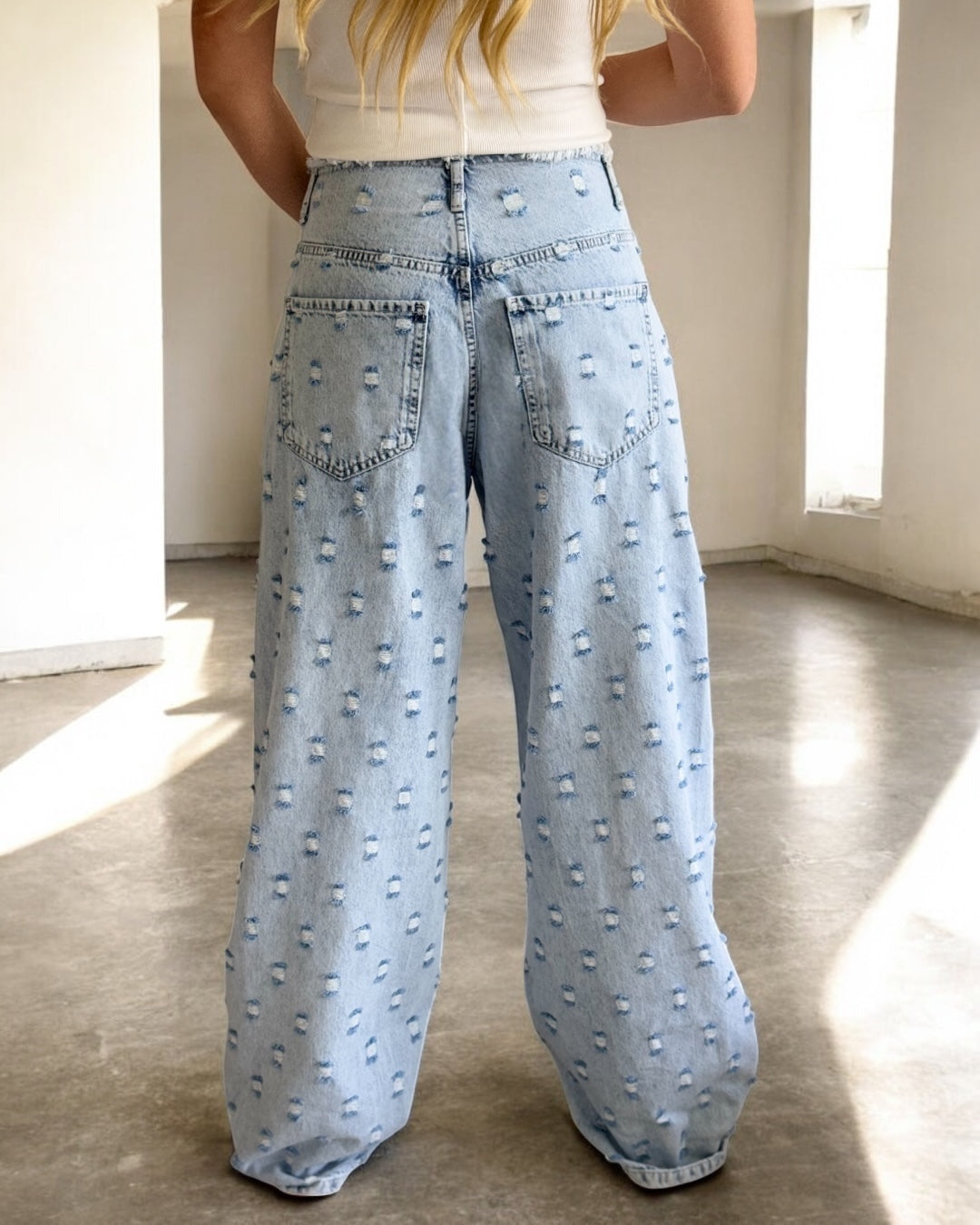 Distressed Flare Denim Jeans